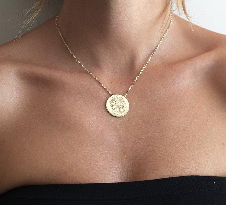 Gold necklace with personalized fingerprint disc pendant