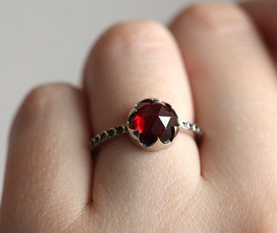 Unique Round Garnet Ring Set with Side Marquise Cut and Round Black Diamonds