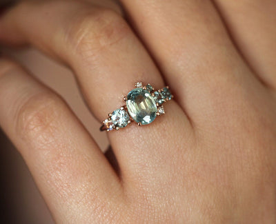 Oval light green sapphire cluster ring with moonstone and diamond gemstones3