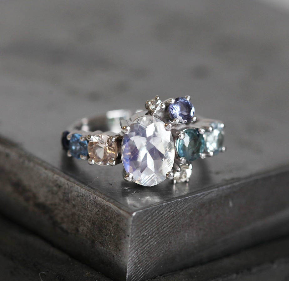 Oval Moonstone Cluster Ring with Side White Diamons, Tanzanite, Sapphire and Aquamarine Gemstones