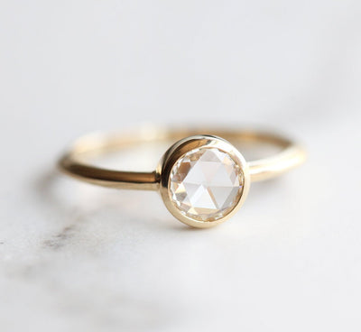 Round white diamond solitaire ring