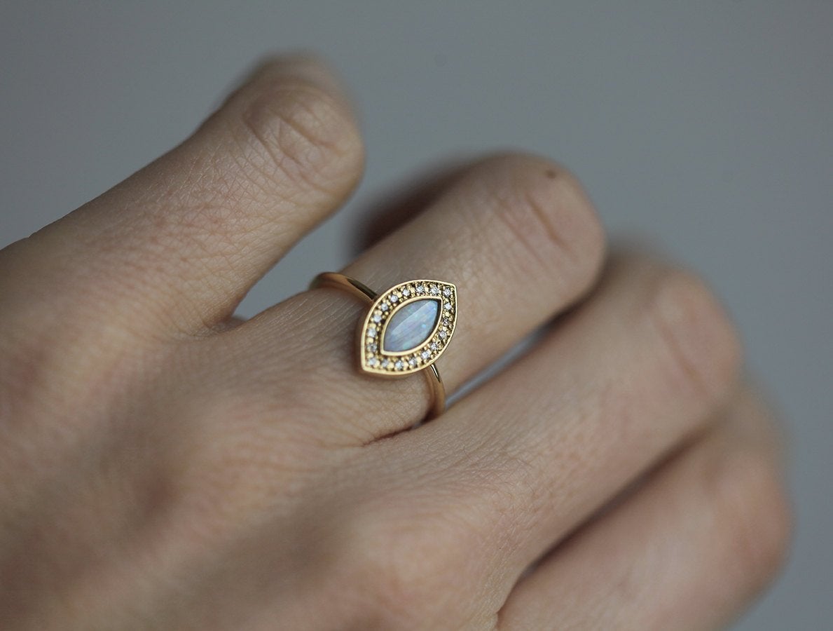 Marquise-Cut White Opal Halo Ring with Round Diamonds