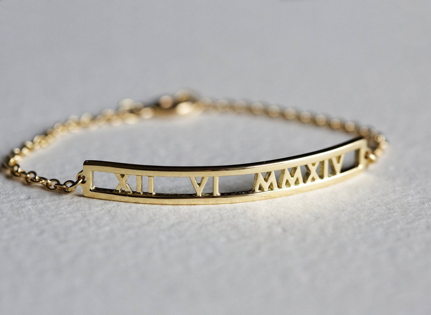 Gold bar chain bracelet with personalized roman numerals