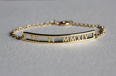 Gold bar chain bracelet with personalized roman numerals