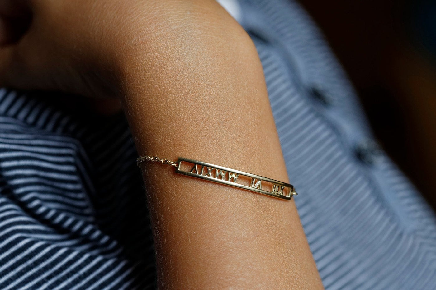 Gold bar chain bracelet with personalized roman numerals