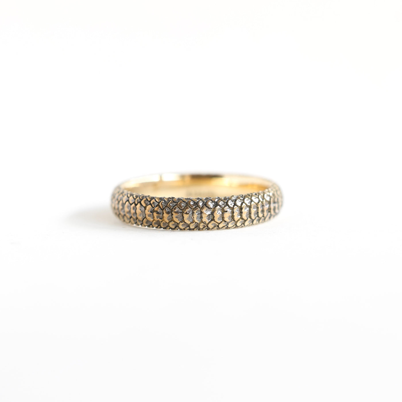 Gold snake textured ring with 14k rose gold band, customizable with gemstones.