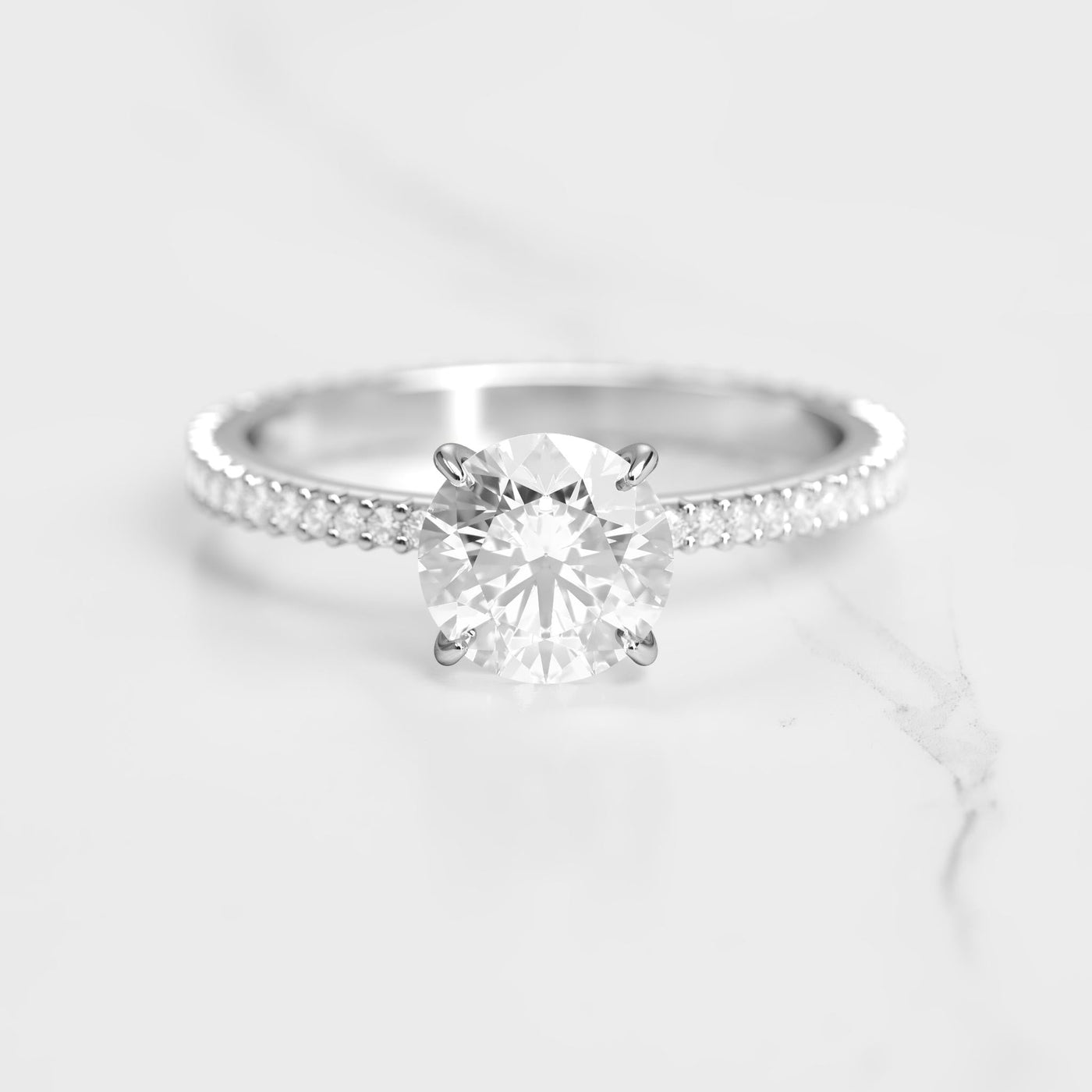 Round full pave tapered moissanite ring