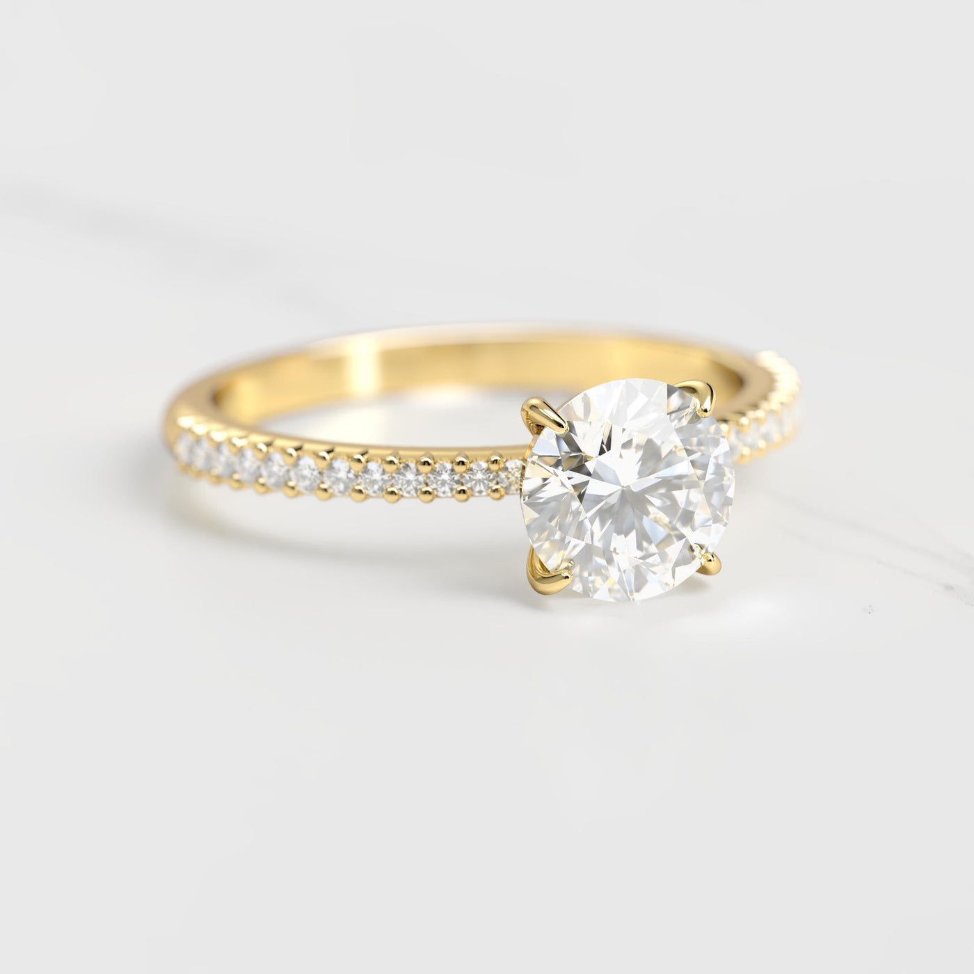 Round half pave tapered diamond eternity ring