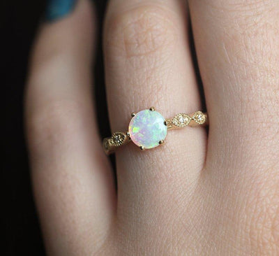 Vintage Eye-Shaped Round Opal Ring with Round White Diamonds in the Center of the Eyes