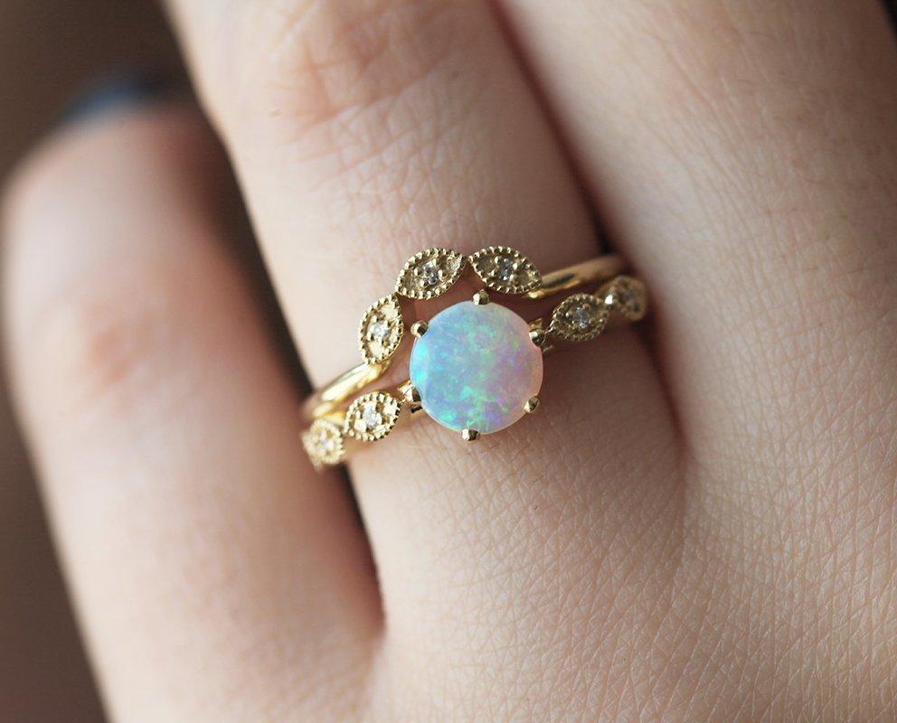 Vintage Eye-Shaped Round Opal Ring with Round White Diamonds in the Center of the Eyes