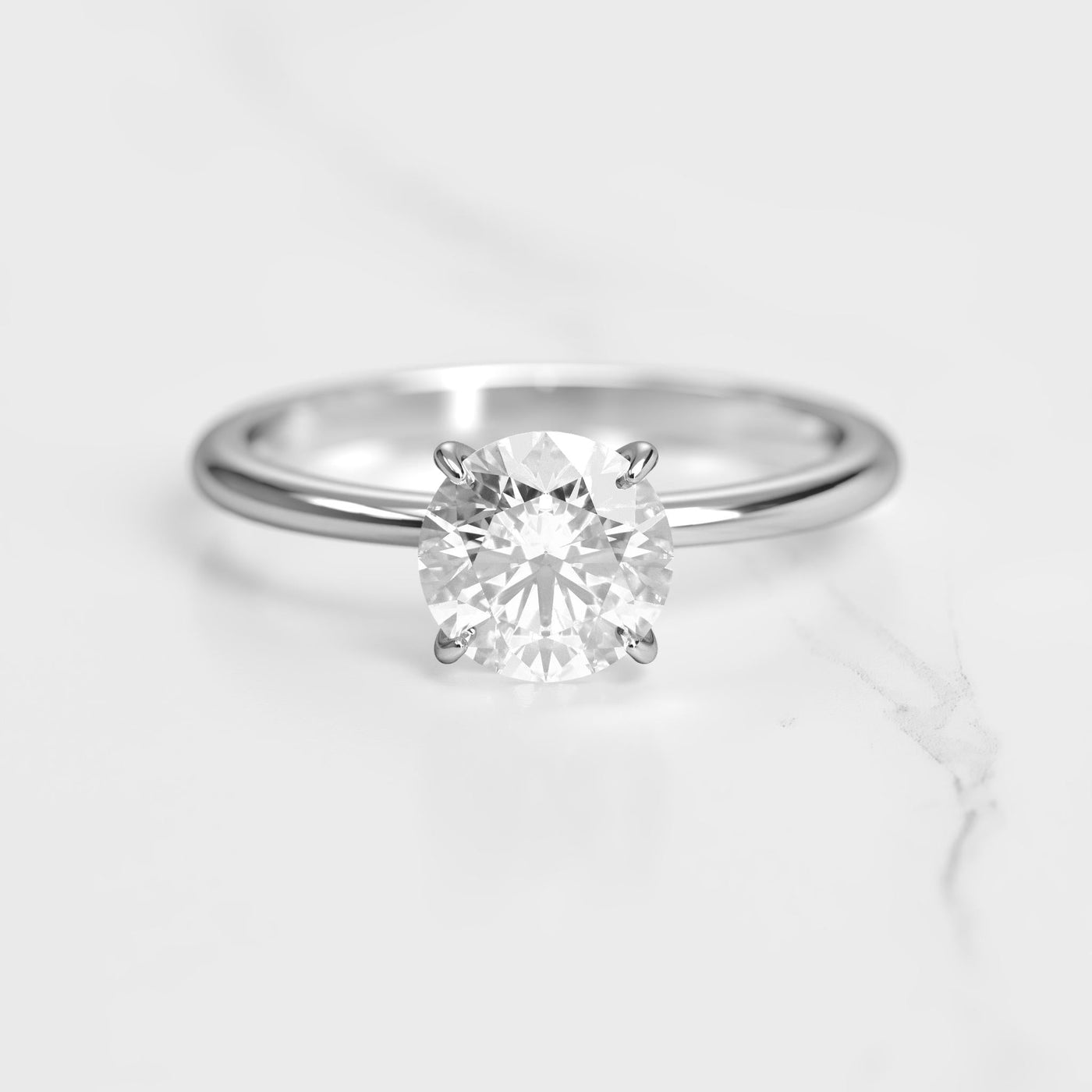 Round solitaire moissanite ring