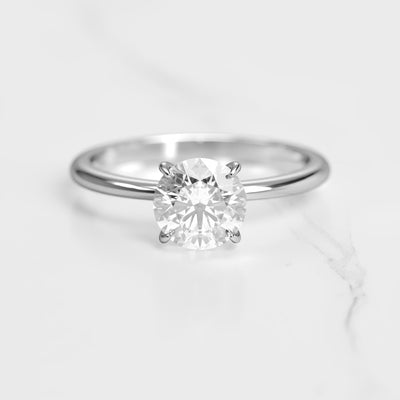 Round solitaire moissanite ring