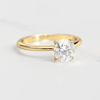 Round solitaire moissanite ring