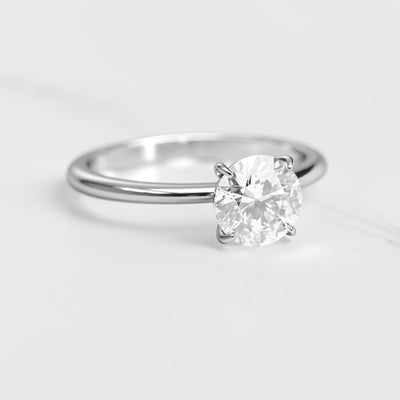 Round solitaire moissanite ring