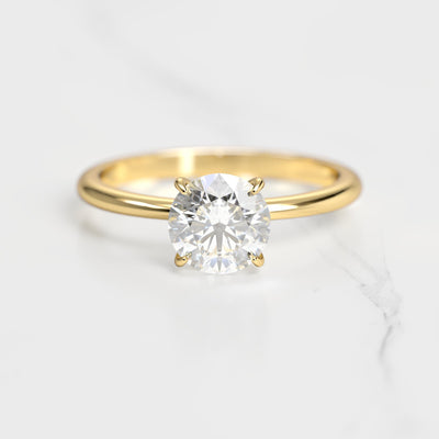 Round solitaire moissanite ring