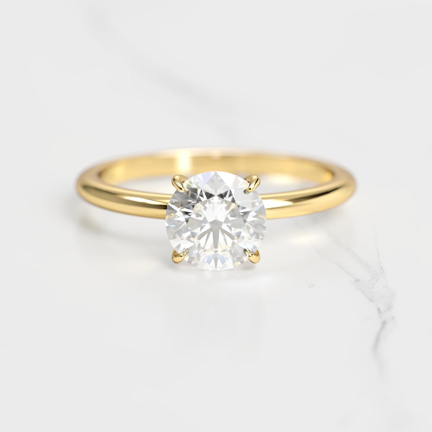 Round tapered solitaire moissanite ring