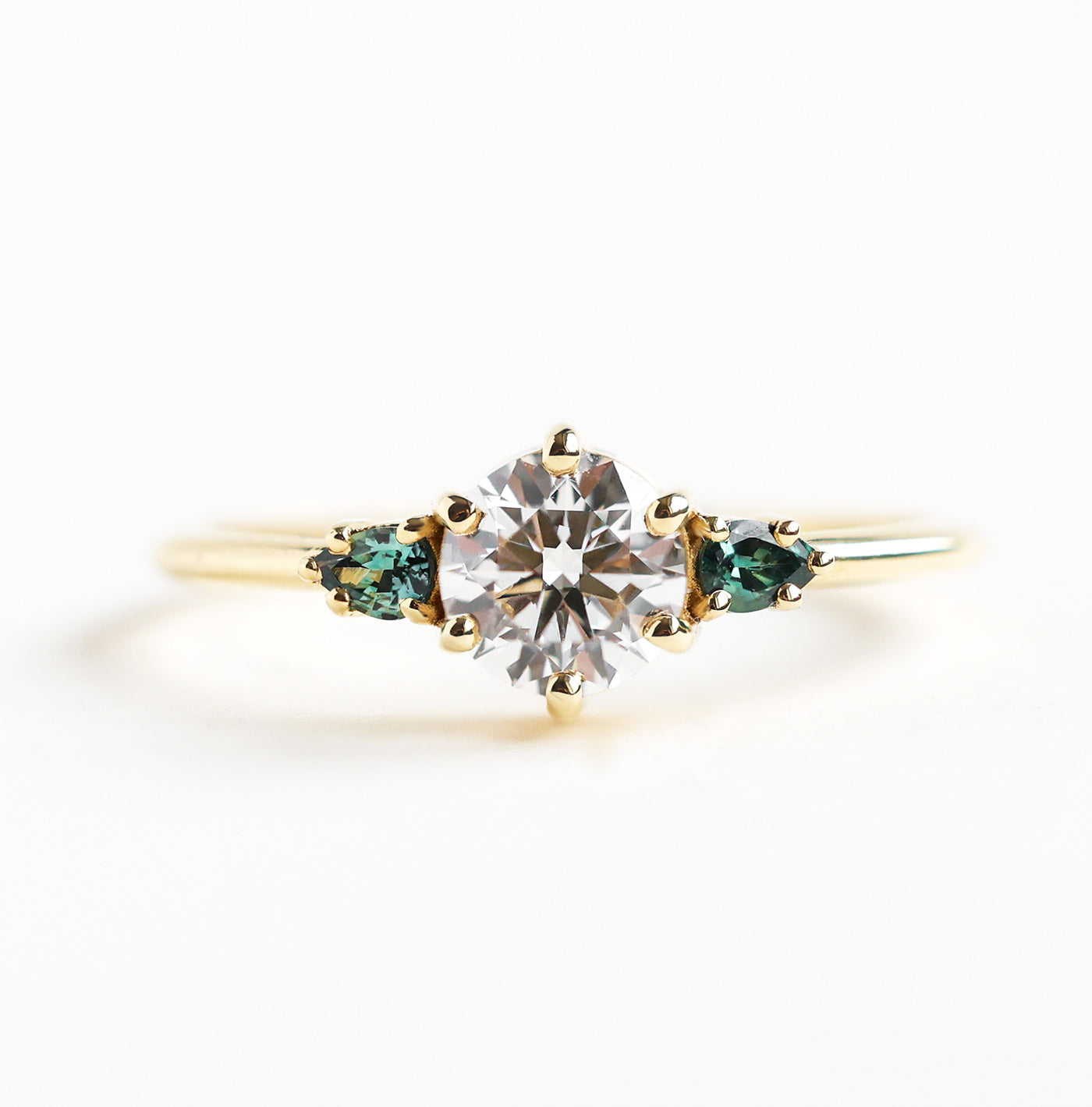 Round Three Stone Diamond Ring With Teal Pear Sapphires