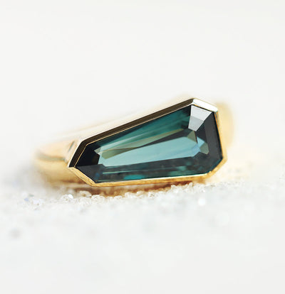 Shield-cut teal sapphire ring