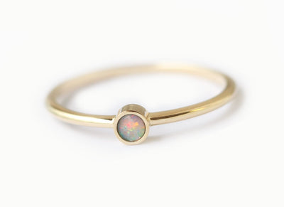 Simplistic Round White Opal Yellow Gold Solitaire Ring