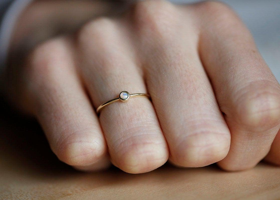 Simplistic Round White Opal Yellow Gold Solitaire Ring