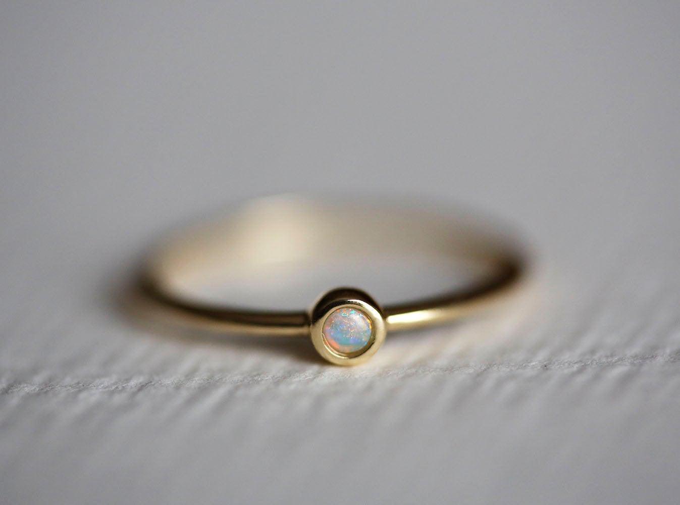 Simplistic Round White Opal Yellow Gold Solitaire Ring