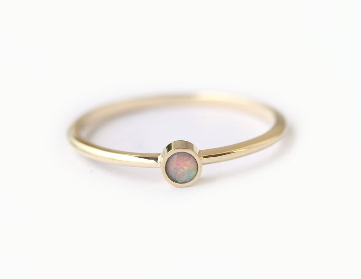 Simplistic Round White Opal Yellow Gold Solitaire Ring