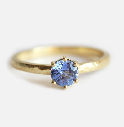 Round blue sapphire and white side diamonds engagement ring set