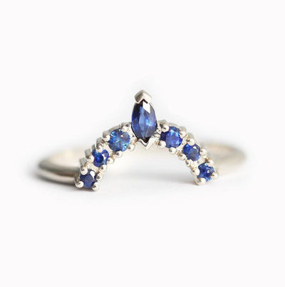 Marquise-cut blue sapphire wedding crown ring with round side sapphires
