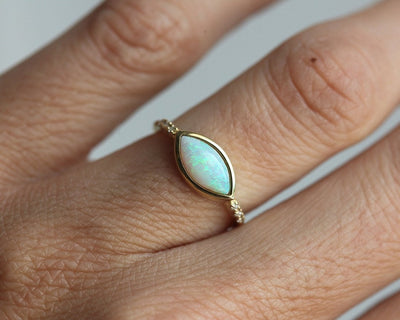 Marquise-Cut White Opal Ring with Accent White Round Diamonds