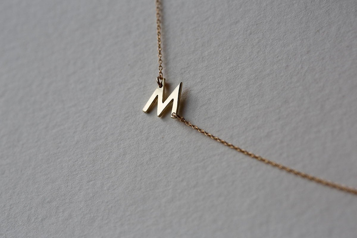 Gold chain necklace with personalized initial