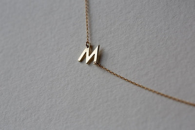 Gold chain necklace with personalized initial