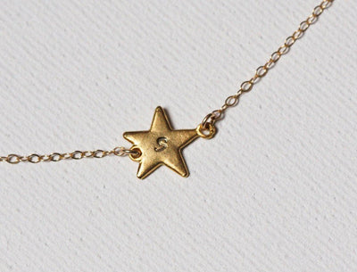 Gold star necklace with personalized sideways initials