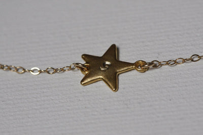 Gold star necklace with personalized sideways initials