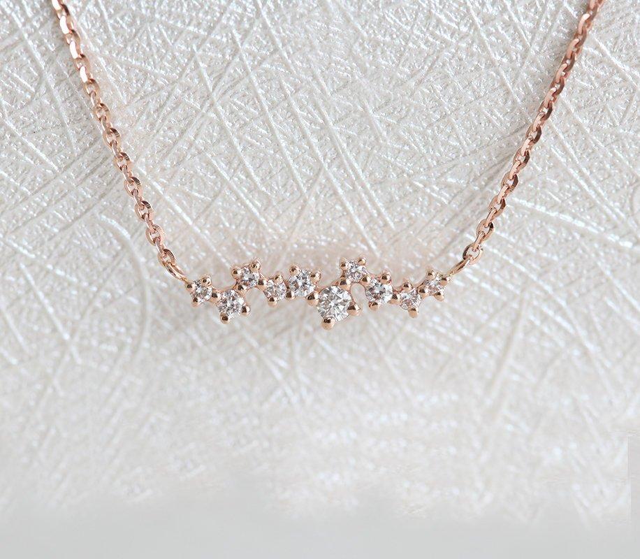 Gold chain necklace with round white diamond cluster