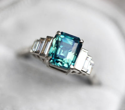 Art-deco radiant-cut blue sapphire ring with white baguette-shaped diamonds