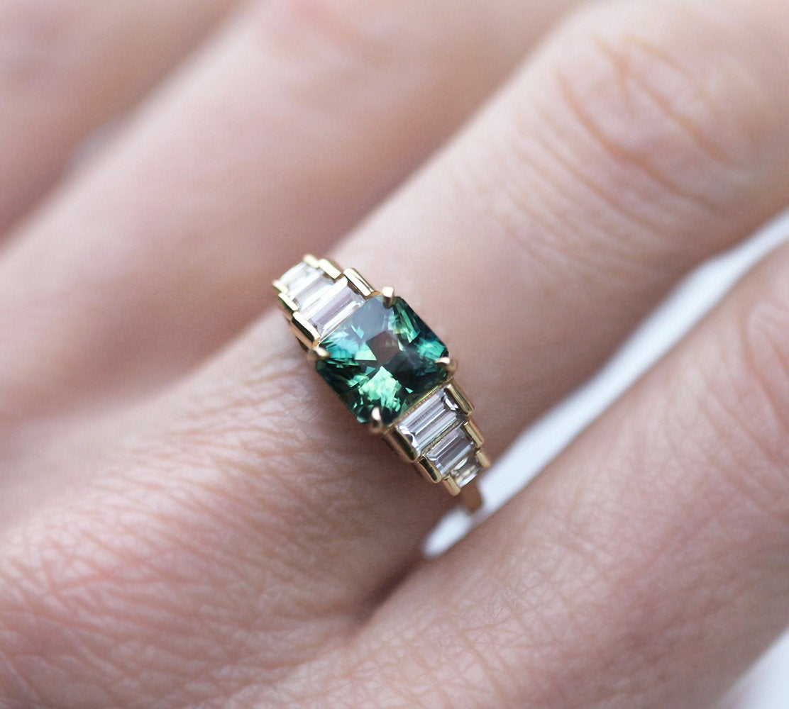 Art-deco radiant-cut bi-color sapphire ring with white baguette-shaped diamonds