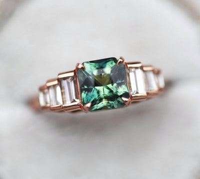 Art-deco radiant-cut bi-color sapphire ring with white baguette-shaped diamonds