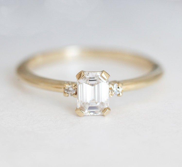 Sleek & Simple Emerald-Cut Diamond Ring With Side Diamonds