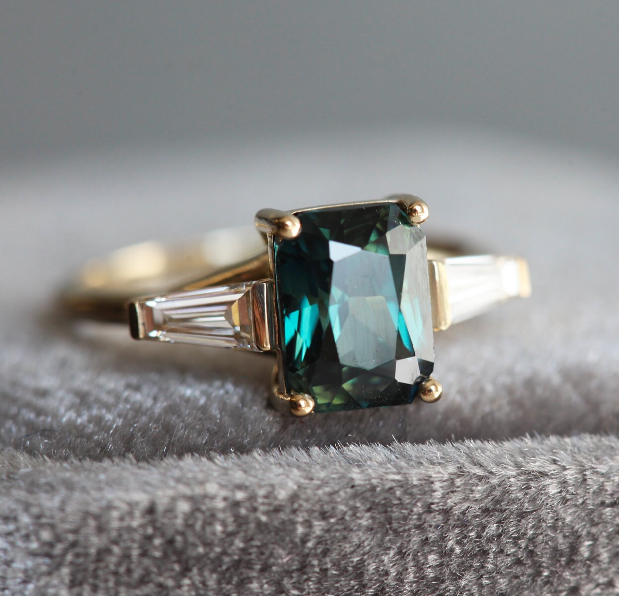 Teal Radiant Alexandrite Ring with 2 Side Baguette-Cut White Diamonds