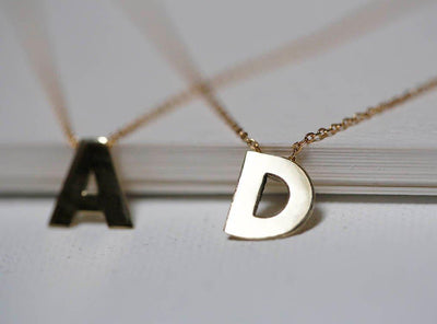 Gold necklace with personalized initial