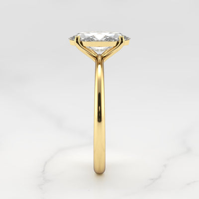 Marquise-cut tapered solitaire moissanite ring