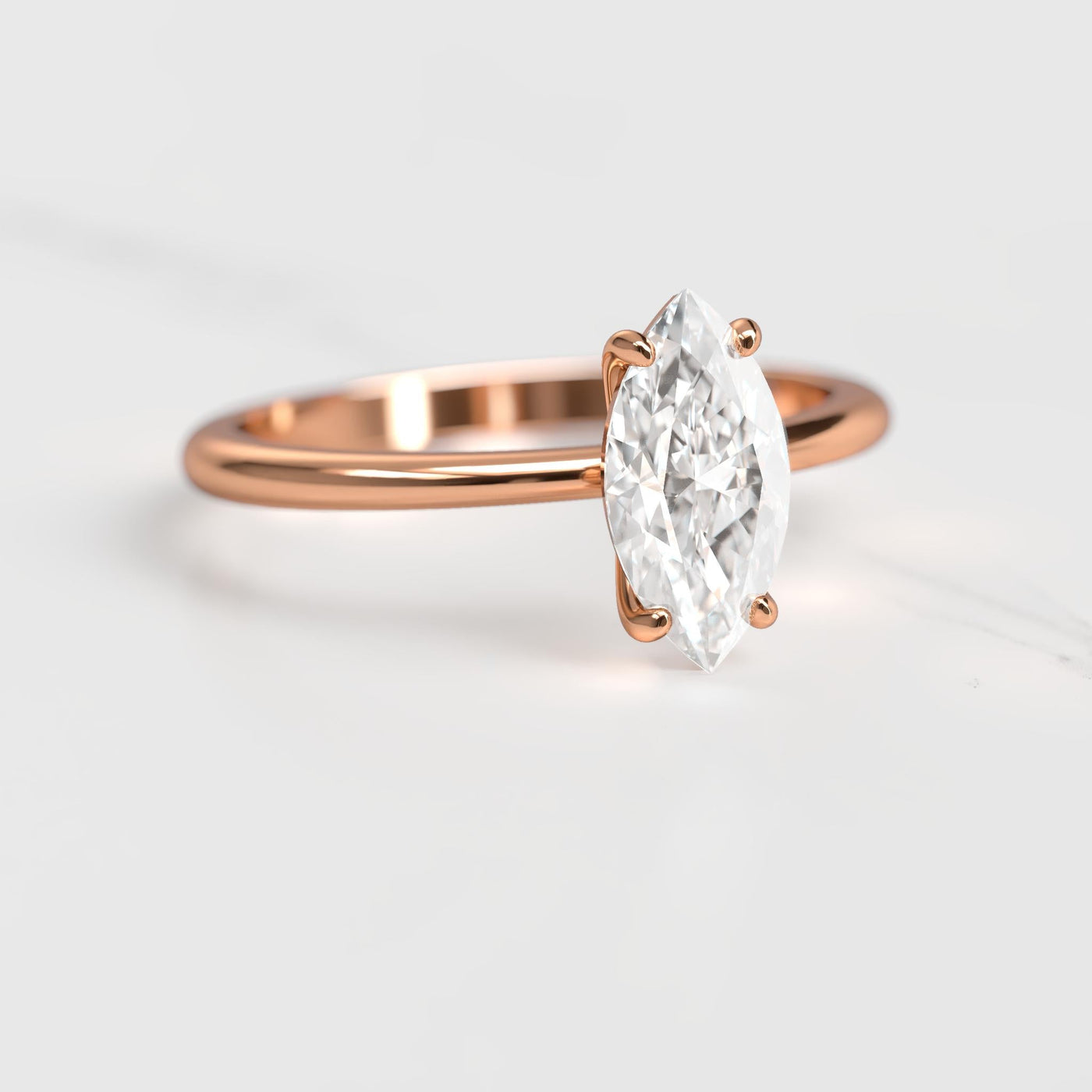 Marquise-cut tapered solitaire moissanite ring