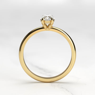 Marquise-cut tapered solitaire moissanite ring