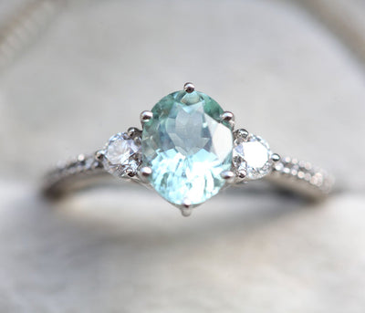 Mint Green Oval Tourmaline Engagement Ring with Accent White Diamonds and Side-Stone Style Band