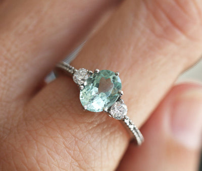 Mint Green Oval Tourmaline Engagement Ring with Accent White Diamonds and Side-Stone Style Band