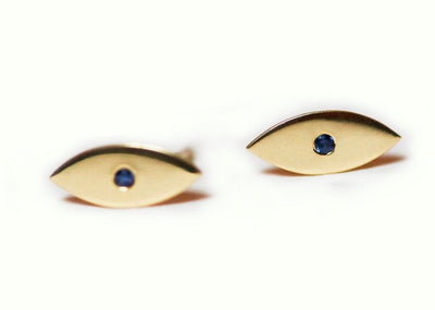 Evil-eye-shaped stud earrings with round blue sapphires