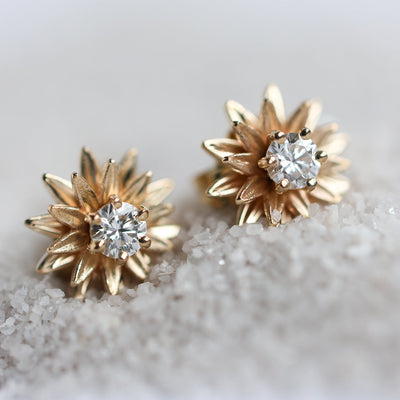 Round diamond and gold sunflower stud earrings