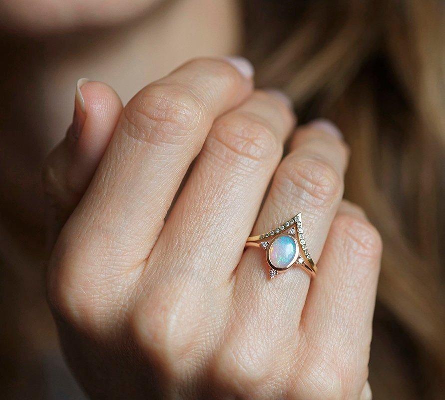 Oval Opal Ring with Symmetrically Placed 4 Side White Round Diamonds with Diamond V-Shaped Band