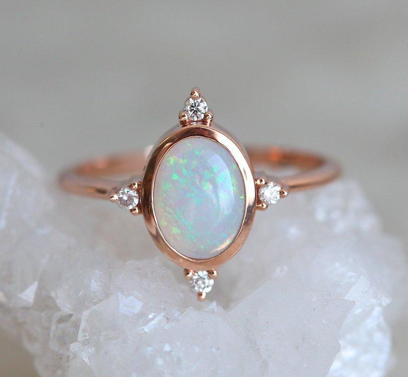 Oval Opal Ring with Symmetrically Placed 4 Side White Round Diamonds