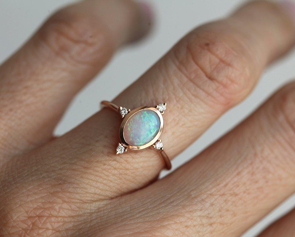 Oval Opal Ring with Symmetrically Placed 4 Side White Round Diamonds